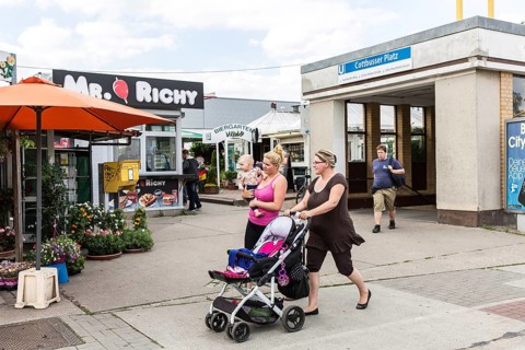 DEU Germany Germany Berlin Living in Berlin-Hellersdorf. Viwa stalls and beer garden in front of a