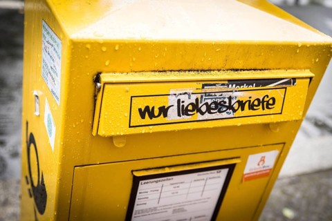 DEU Germany Germany Berlin Deutsche Post box on Masurenallee with the grafitti 'nur Liebesbreife'