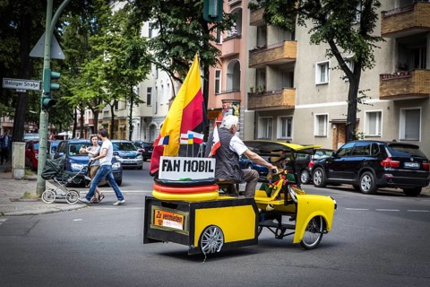 DEU Germany Germany Berlin A man drives through Schöneberg in a self-made European championship