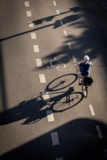 DEU Germany Germany Berlin Cyclists on Schlossstraße in Steglitz