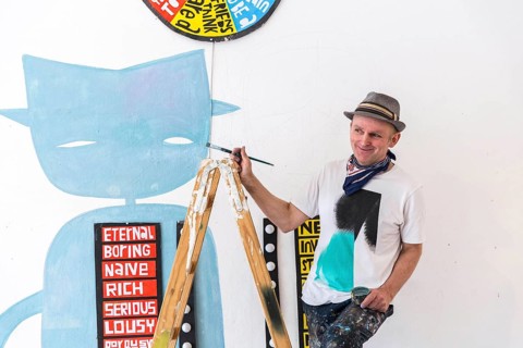 DEU Germany Germany Berlin The artist Jim Avignon setting up an exhibition at the 'Retram' gallery