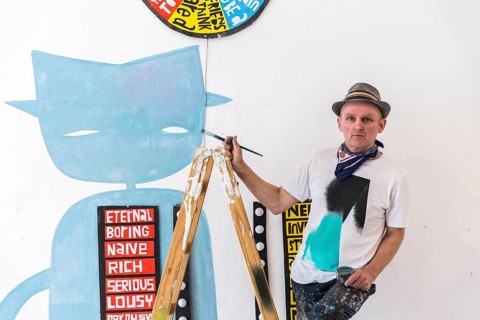 DEU Germany Germany Berlin The artist Jim Avignon setting up an exhibition at the 'Retram' gallery
