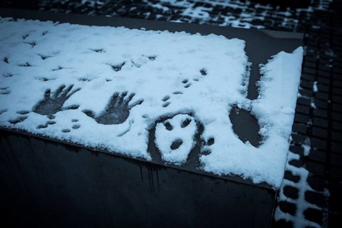 DEU Germany Germany Berlin Messages immortalized in snow from visitors to the Holocaust Memorial in