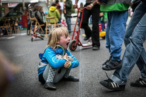 DEU Germany Germany Berlin Children play on Gudvanger Straße, which has been declared the city's