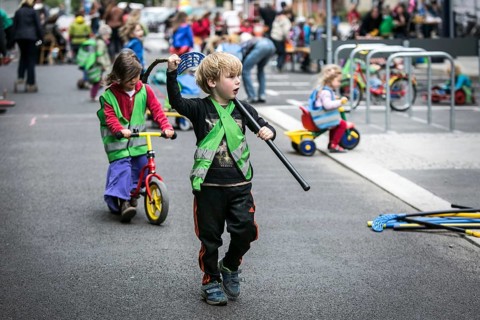 DEU Germany Germany Berlin Children play on Gudvanger Straße, which has been declared the city's