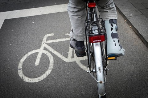 DEU Germany Germany Berlin Cyclists with splints on a bicycle path in Mitte