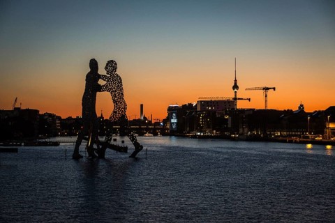 DEU Germany Germany Berlin View over Osthafen across the Spree towards Alex at sunset