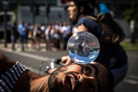 DEU Germany Germany Berlin Juggler with crystal ball works at the intersection opposite the CDU