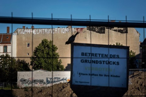 DEU Germany Germany Berlin A graffiti with the inscription 'Fight Gentrification' on a house wall
