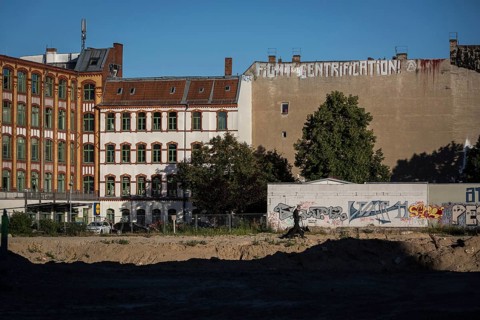 DEU Germany Germany Berlin A graffiti with the inscription 'Fight Gentrification' on a house wall