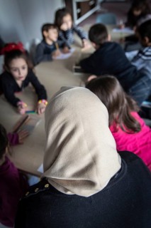 DEU Germany Germany Berlin An animation team entertains refugee children in an asylum center in