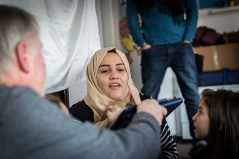 DEU Germany Germany Berlin An animation team entertains refugee children in an asylum center in