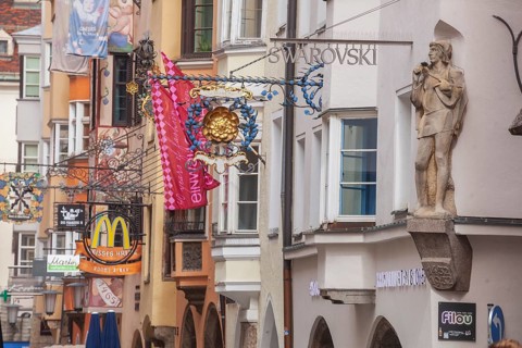 Golden roof, lots of people and historic houses in Herzog-Friedrich-Straße, Altstadt, Innsbruck,