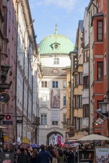 Hofgasse with Hofburg Imperial Palace, historic houses and many people, old town, Innsbruck, Tyrol,