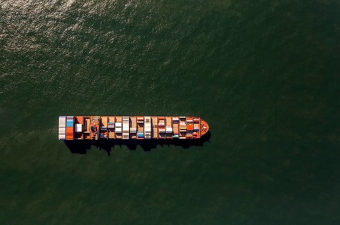 Container ship Maersk Lavras at anchor, aerial view, cargo ships at anchor off Spiekeroog, shipping