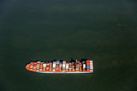 Container ship Maersk Lavras at anchor, aerial view, cargo ships at anchor off Spiekeroog, shipping