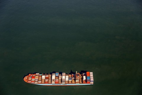 Container ship Maersk Lavras at anchor, aerial view, cargo ships at anchor off Spiekeroog, shipping