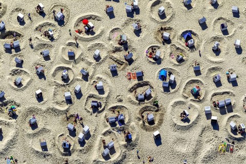 Sandy beach beach with beach chairs and sand walls, sand castles, aerial view, Wangerooge, North