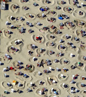Sandy beach beach with beach chairs and sand walls, sand castles, aerial view, Wangerooge, North