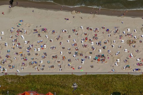 Sandy beach beach with beach chairs and sand walls, sand castles, aerial view, Wangerooge, North