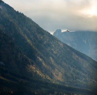Motorised glider flying over the Alps, Salzburg, Alps, Austria, Europe, aerial view, birds-eyes