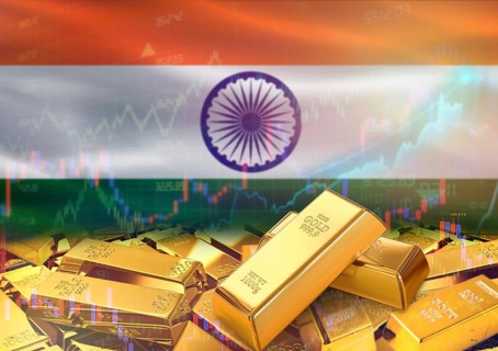 Gold bars on India flag in background. Gold bars stacked on Indian flag. Concept of India gold