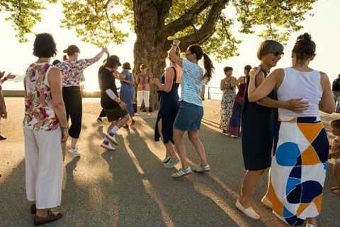 People dancing in the sun, Promenade, Bregenz, Lake Constance, Vorarlberg, Austria