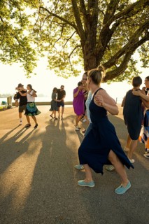 People dancing in the sun, Promenade, Bregenz, Lake Constance, Vorarlberg, Austria