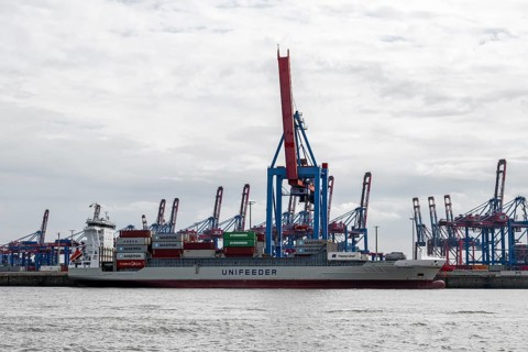 Container ship, loading cranes and stacks of containers, Port of Hamburg, container terminal,