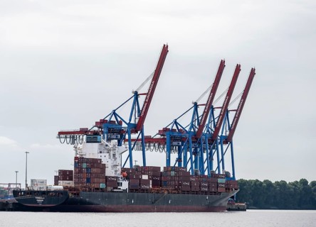 Container ship, loading cranes and stacks of containers, Port of Hamburg, container terminal,