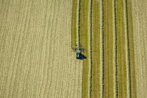 Aerial view, agricultural area, tractor mowing meadow, Gennebreck, Sprockhövel, Ruhr area, North