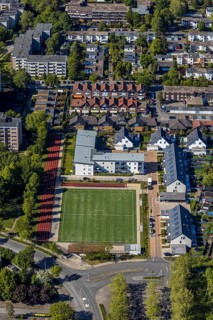 Aerial view, sports field Enkircher Weg, terraced houses, Unna, Ruhr area, North Rhine-Westphalia,