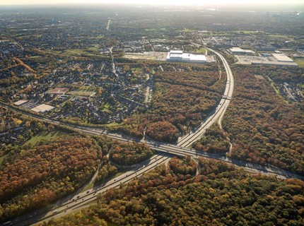 Aerial view, motorway junction Oberhausen, motorway A2, federal road B516, forest area in autumn