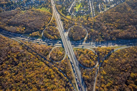 Aerial view, motorway junction Oberhausen, motorway A3, federal road B516, forest area in autumn