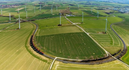 Aerial view, wind turbines on the B55 federal road, train on railway line, Warstein, North