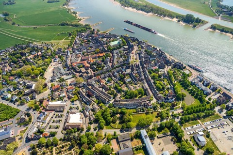 Aerial view, town view Rees, river Rhine, catholic church St. Assumption of the Virgin Mary,