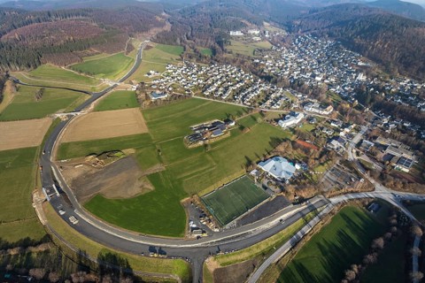 Aerial view, new construction of the bypass road L776n Bad Fredeburg, SauerlandBad, sports field,
