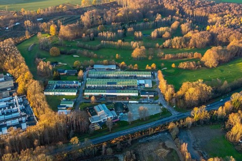 Aerial photo, Westerhaar industrial estate, TÜV NORD inspection centre Wickede Werl, golf course