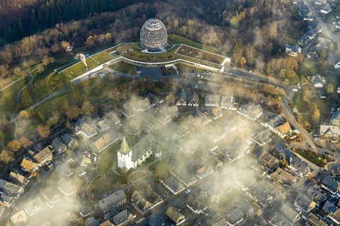 Aerial view, Winterberg centre, Catholic church looking out of the clouds, Oversum Vital Resort,