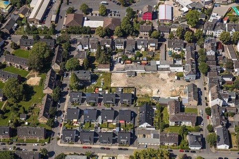 Aerial view, newly built residential buildings, area of former demolished buildings
