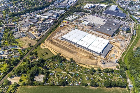 Aerial view, construction site of new Amazon logistics centre, industrial estate on Brauckstrasse,