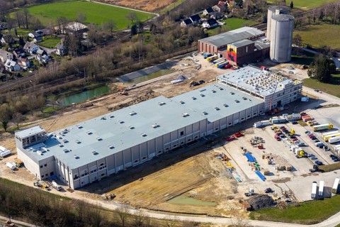Aerial view, industrial estate northwest, construction site new building logistics hall
