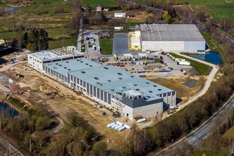 Aerial view, industrial estate northwest, construction site new building logistics hall