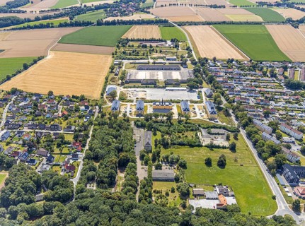 Aerial view, former Kanaal van Wessem barracks, military chapel being restored, Hiddinser Weg,