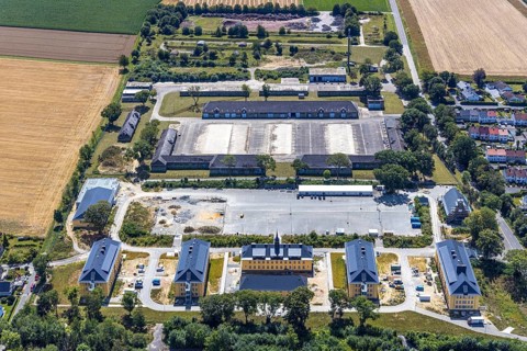 Aerial view, former Kanaal van Wessem barracks, military chapel being restored, Hiddinser Weg,