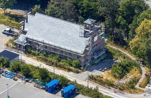 Aerial view, former Kanaal van Wessem barracks, military chapel being restored, Hiddinser Weg,