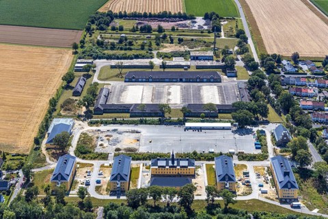 Aerial view, former Kanaal van Wessem barracks, military chapel being restored, Hiddinser Weg,