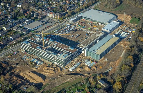 Aerial view, construction site, new Edeka headquarters, Rheinberger Straße, Rheinkamp-Utfort, Mörs,