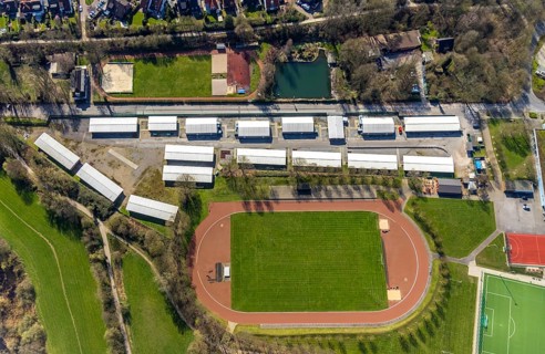 Aerial view, refugee accommodation, sports field Turnerschaft 1912 Mülheim-Saarn, football pitches,