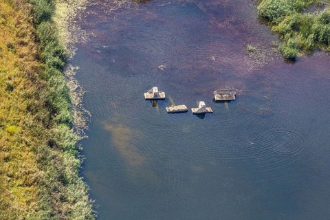 Aerial view, former sewage sludge landfill, concrete parts in pond, Menden, Sauerland, Märkischer